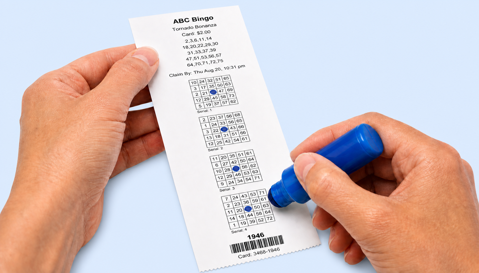 A player manually daubing a printed Tornado Bonanza bingo card